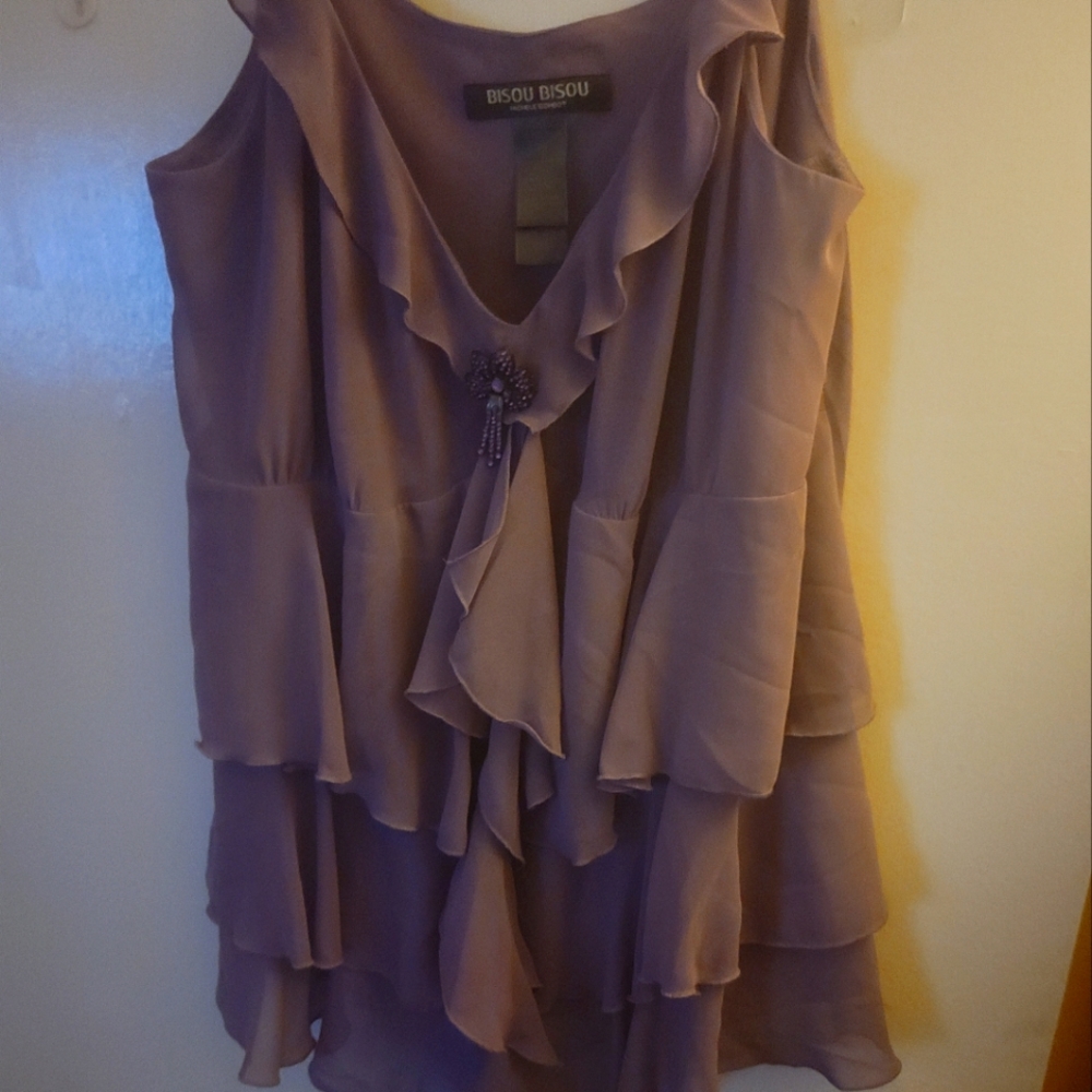 Cute deep purple tank top with broach in the middle